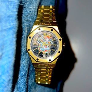 Used Mens Ed Hardy gold watch